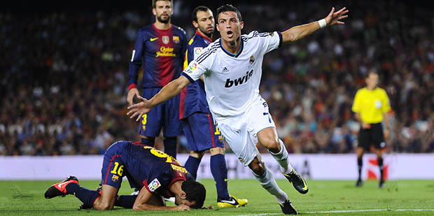 BARCELONA, SPAIN - AUGUST 23: Cristiano Ronaldo of Real Madrid CF celebrates after scoring the opening goal during the Super Cup first leg match between FC Barcelona and Real Madrid at Camp Nou on August 23, 2012 in Barcelona, Spain. (Photo by David Ramos/Getty Images)