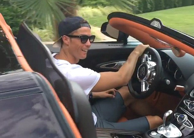 Ronaldo driving his Bugatti Veyron of 1.7 m pounds in his 7.1 m dollar house!