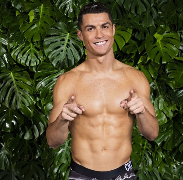 Cristiano Ronaldo shows his bulging biceps and rock hard abs as he strips off for CR7 underwear campaign