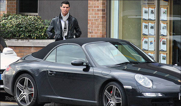 Ronaldo Alongside his Audi Car