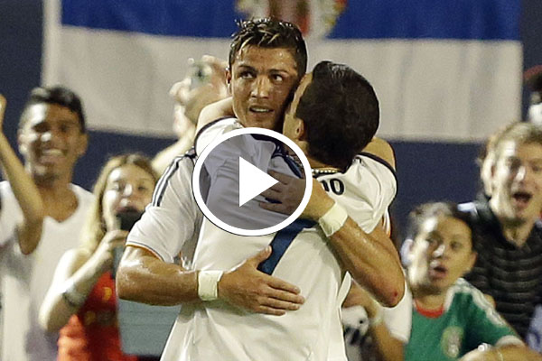 Cristiano Ronaldo shows the best way to deal with two pitch invaders ahead of Portugal game