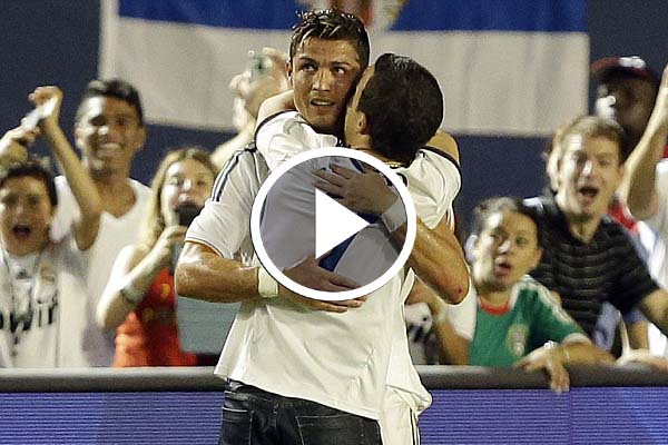 Cristiano Ronaldo kissed by a fan in the ground