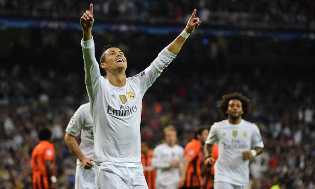 Real Madrid's Portuguese forward Cristiano Ronaldo celebrates a goal during the UEFA Champions League group A football match Real Madrid CF vs FC Shakhtar Donetsk at the Santiago Bernabeu stadium in Madrid on September 15, 2015. AFP PHOTO/ PIERRE-PHILIPPE MARCOUPIERRE-PHILIPPE MARCOU/AFP/Getty Images