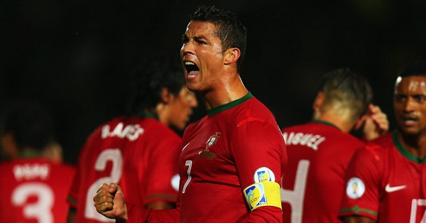 BELFAST, NORTHERN IRELAND - SEPTEMBER 06:  Cristiano Ronaldo of Portugal celebrates scoring during the FIFA 2014 World Cup Qualifying Group F match between Northern Ireland and Portugal at Windsor Park on September 6, 2013 in Belfast, Northern Ireland.  (Photo by Bryn Lennon/Getty Images)