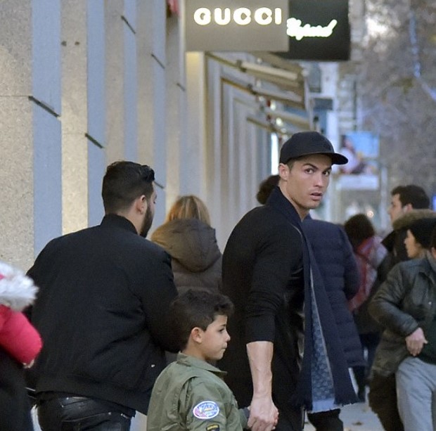 Real madrid star Cristiano Ronaldo enjoys the bonding time with his son as pair take shopping trip